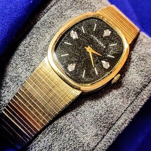 Longines Elegant Gold and Black Watch